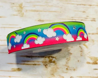 7/8" Rainbows with silver holographic outline on ombre USDR grosgrain ribbon